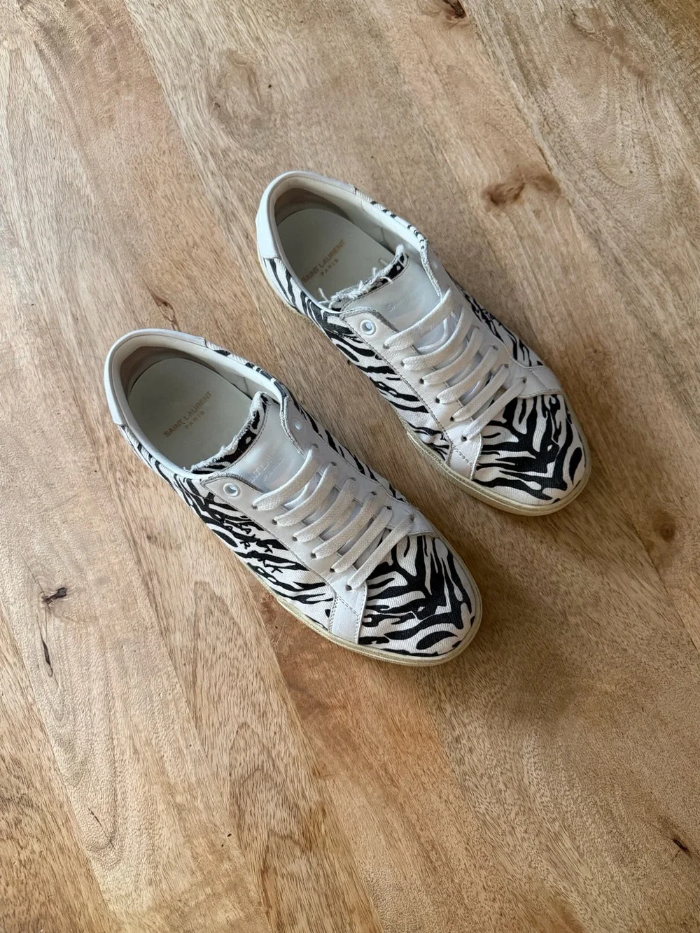 Saint Laurent Paris Zebra Print Lace-Up Sneakers in White and Black